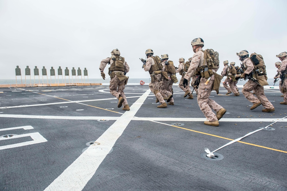 11th Marine Expeditionary Unit (MEU) Maritime Raid Force (MRF) Practices Live Fire Weapons Shoot Aboard USS Somerset.