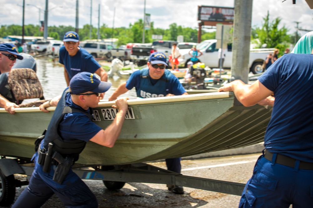 Coast Guard teams coordinate with local, state and federal agencies in flood rescues