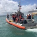 A Coast Guard boat crew evacuates passengers from the vessel Caribbean Fantasy in San Juan, Puerto Rico on August 17, 2016.