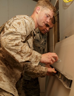 4th MLG Marines work with Airmen to renovate historic fort