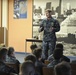 Commander, Submarine Squadron 11 speaks to midshipmen