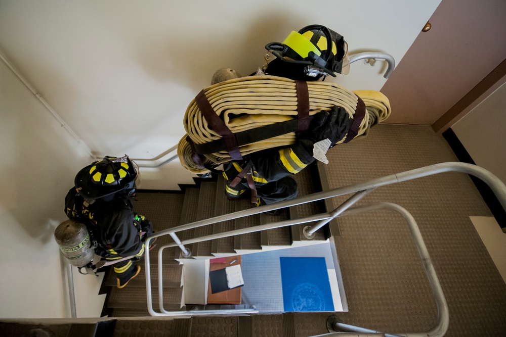 18 CES firefighters conduct tower evacuation drill