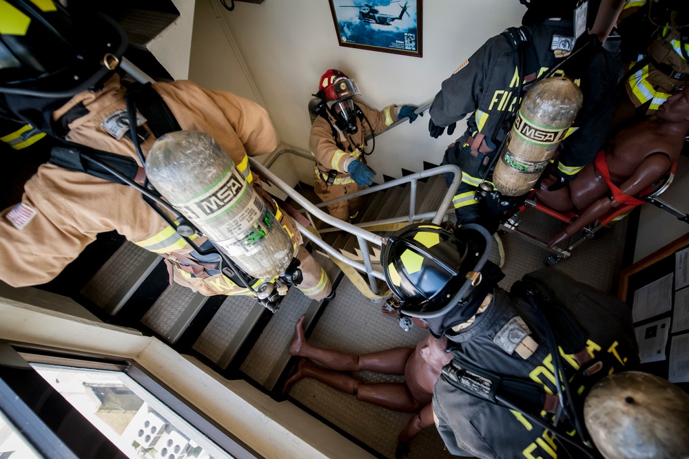 18 CES firefighters conduct tower evacuation drill