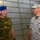 The Commanding General of the Norwegian Brigade-North Brigadier Eldar Berli share a laugh with Chief of Staff of 2nd Marine Expedition Brigade, Col. Will Bentley in the well deck aboard the amphibious assault ship USS Bataan (LHD 5).