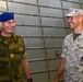 The Commanding General of the Norwegian Brigade-North Brigadier Eldar Berli share a laugh with Chief of Staff of 2nd Marine Expedition Brigade, Col. Will Bentley in the well deck aboard the amphibious assault ship USS Bataan (LHD 5).