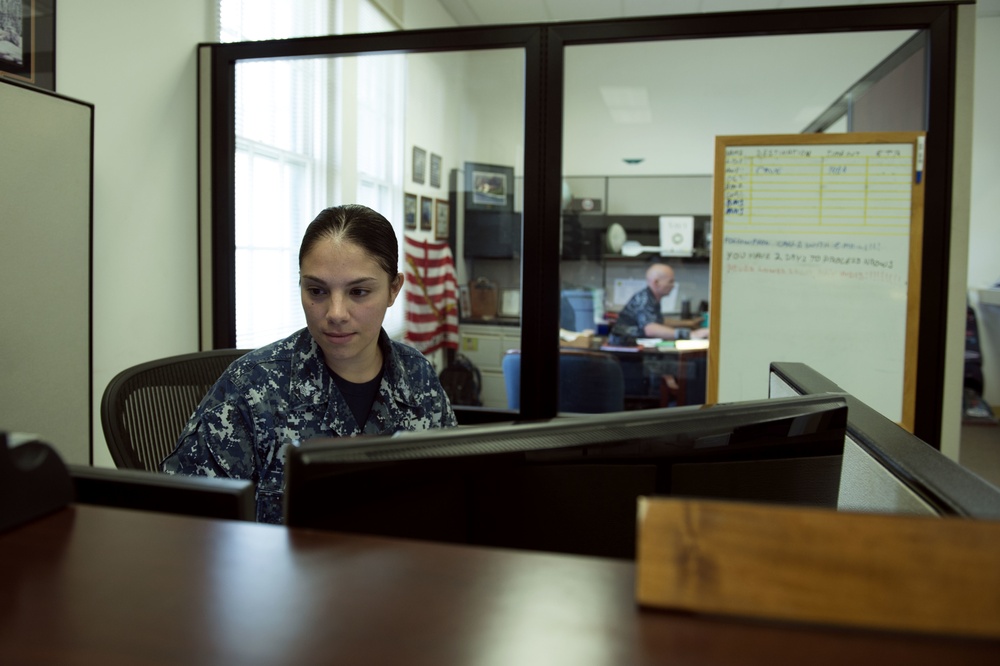 Petty Officer 1st Class Mariana Aragon processes the orders for over 150 Reservists who are participating in the Rim of the Pacific Exercise 2016.