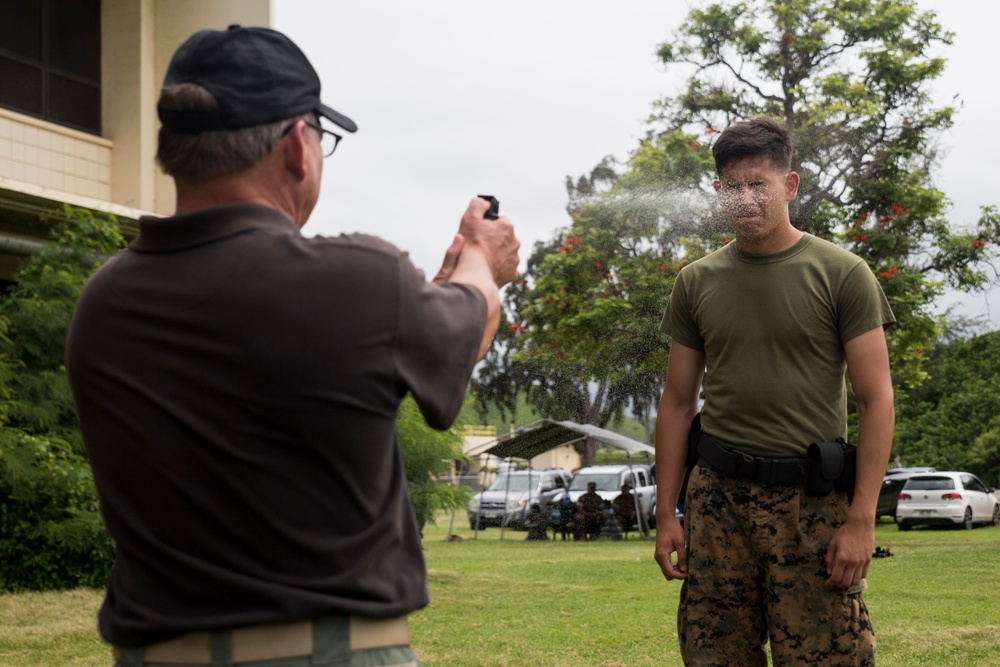 Marines shed tears, fight through pepper spray