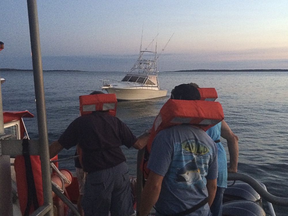 Coast Guard rescues 4 after boat fire near Vineyard Sound, Mass.