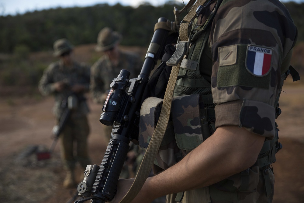Weapon exchange: U.S. and French forces conduct familiarization training