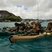 Troops overboard: U.S. Marines, French Army soldiers paddle out to Orphelinat Bay
