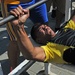 American servicemembers participate in friendly strongman competition