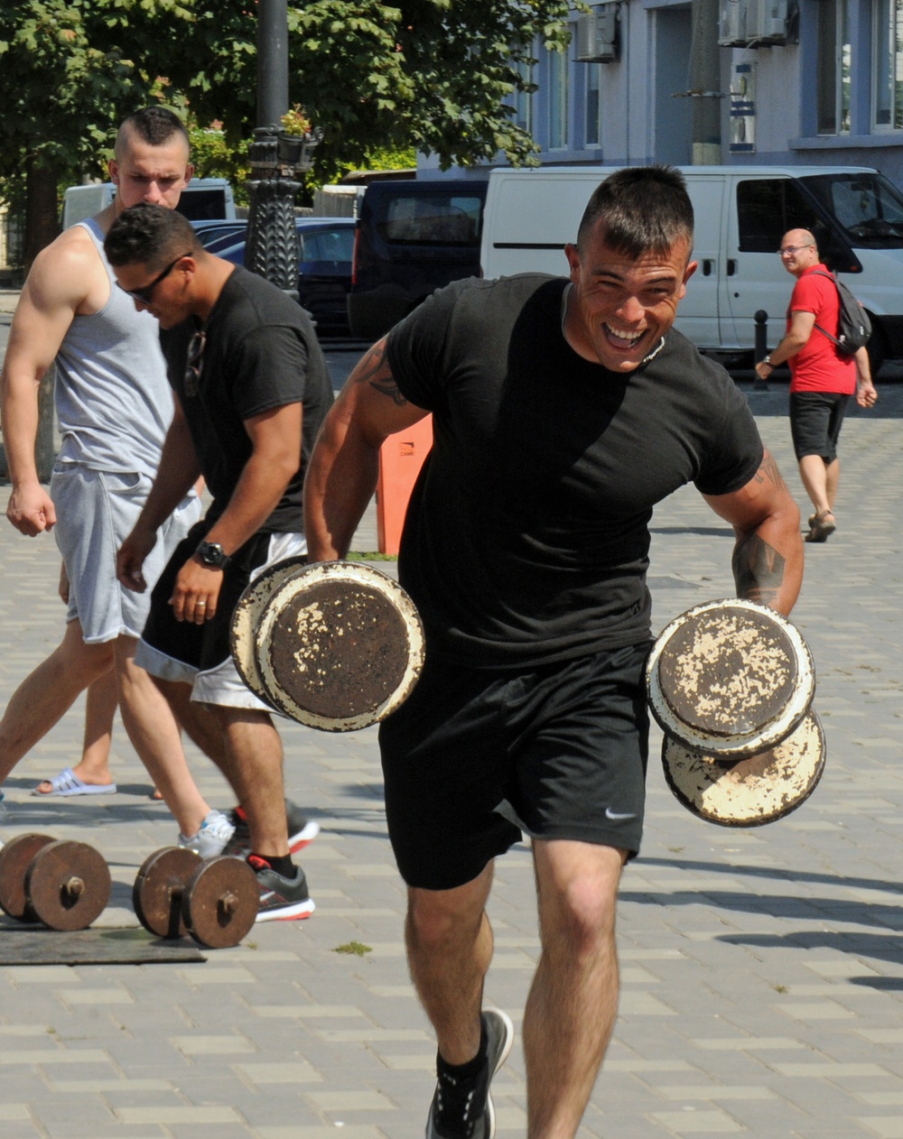 American servicemembers participate in friendly strongman competition