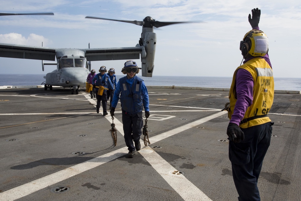 Moving runway and tilting rotors aboard USS Green Bay (LPD-20)