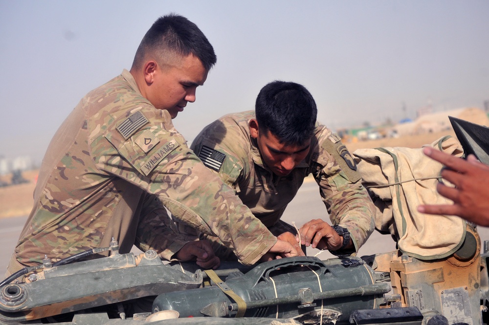 Task Force Strike artillerymen, aviators conduct sling load training