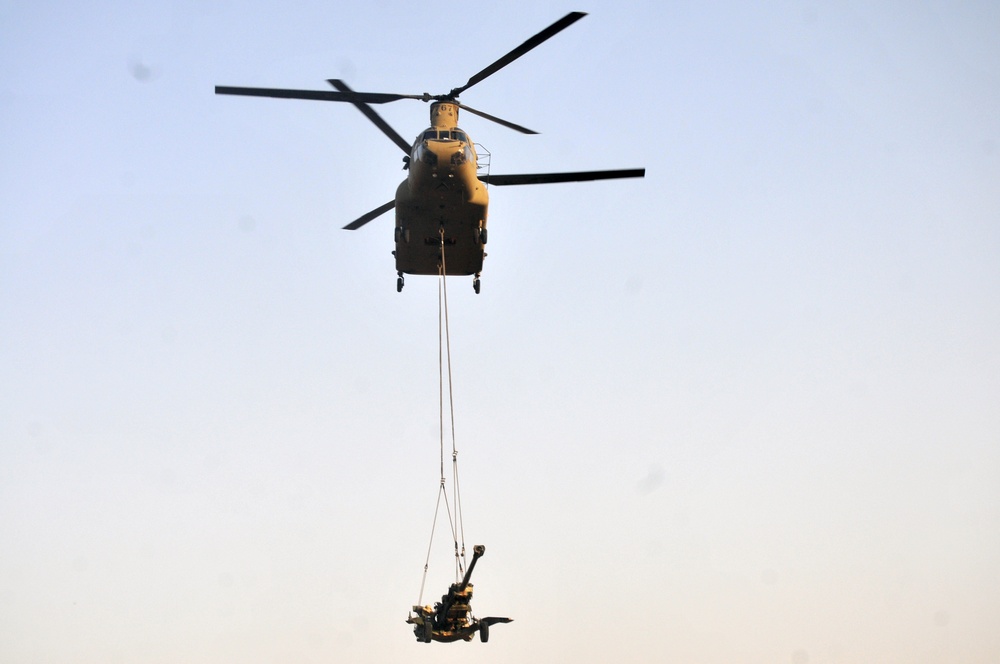 Task Force Strike Artillerymen, aviators conduct sling load training
