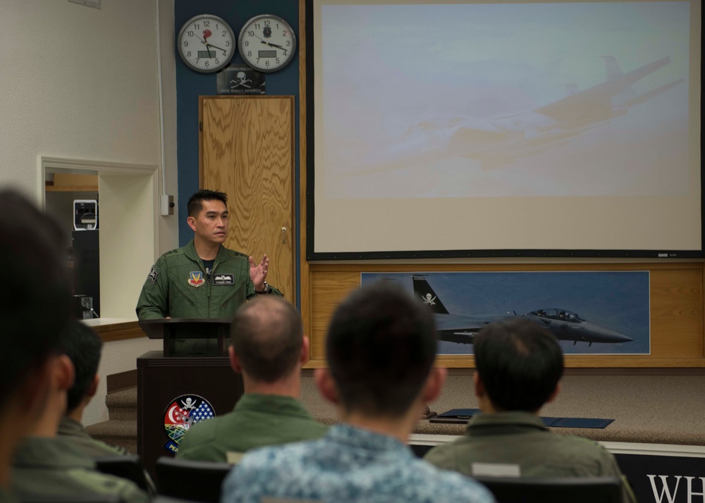 Singaporean leaders visit, recognize first weapons instructors