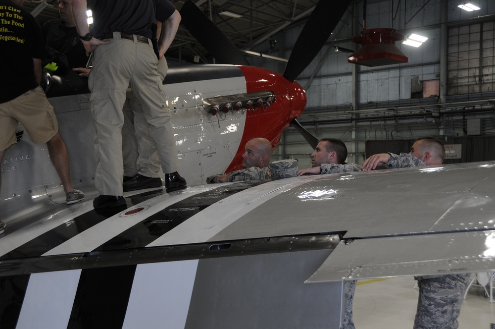 WWII-Vintage P-51C Mustang Fighter is on display during the Vermont Air National Guard's 70th Anniversary
