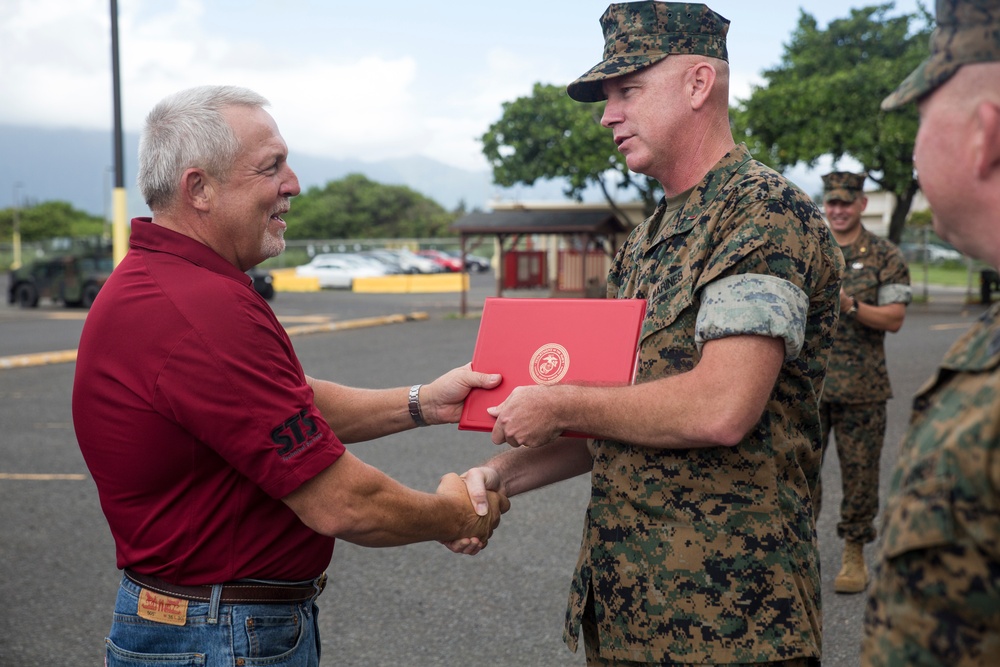 III MEF Marines present certificates of appreciation to Oshkosh Defense contractors