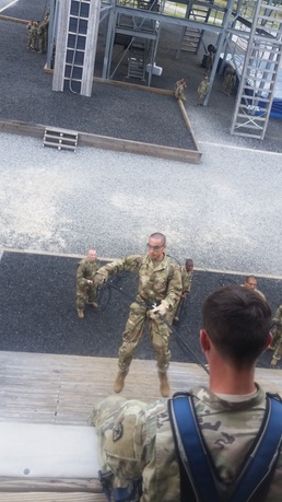 Soldiers tackle mini wall