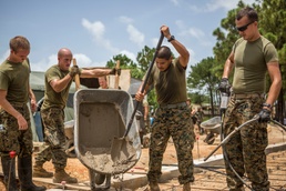 SMAGTF-SC Marines and Honduran engineers work prepare foundation of the Republica de Cuba school