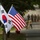 American and South Korean flags at Yongin