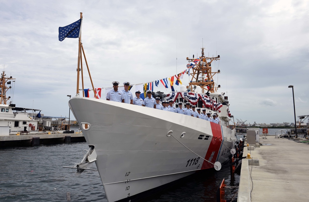 Coast Guard Cutter Joseph Tezanos crew mans the rail during the cutter's commissioning ceremony.