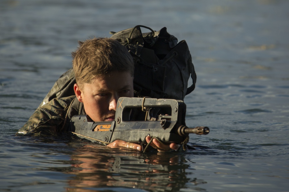 U.S. Marines and French soldiers swim Noumea coastline