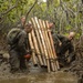 U.S. Marines and French soldiers get down and dirty in the mangroves