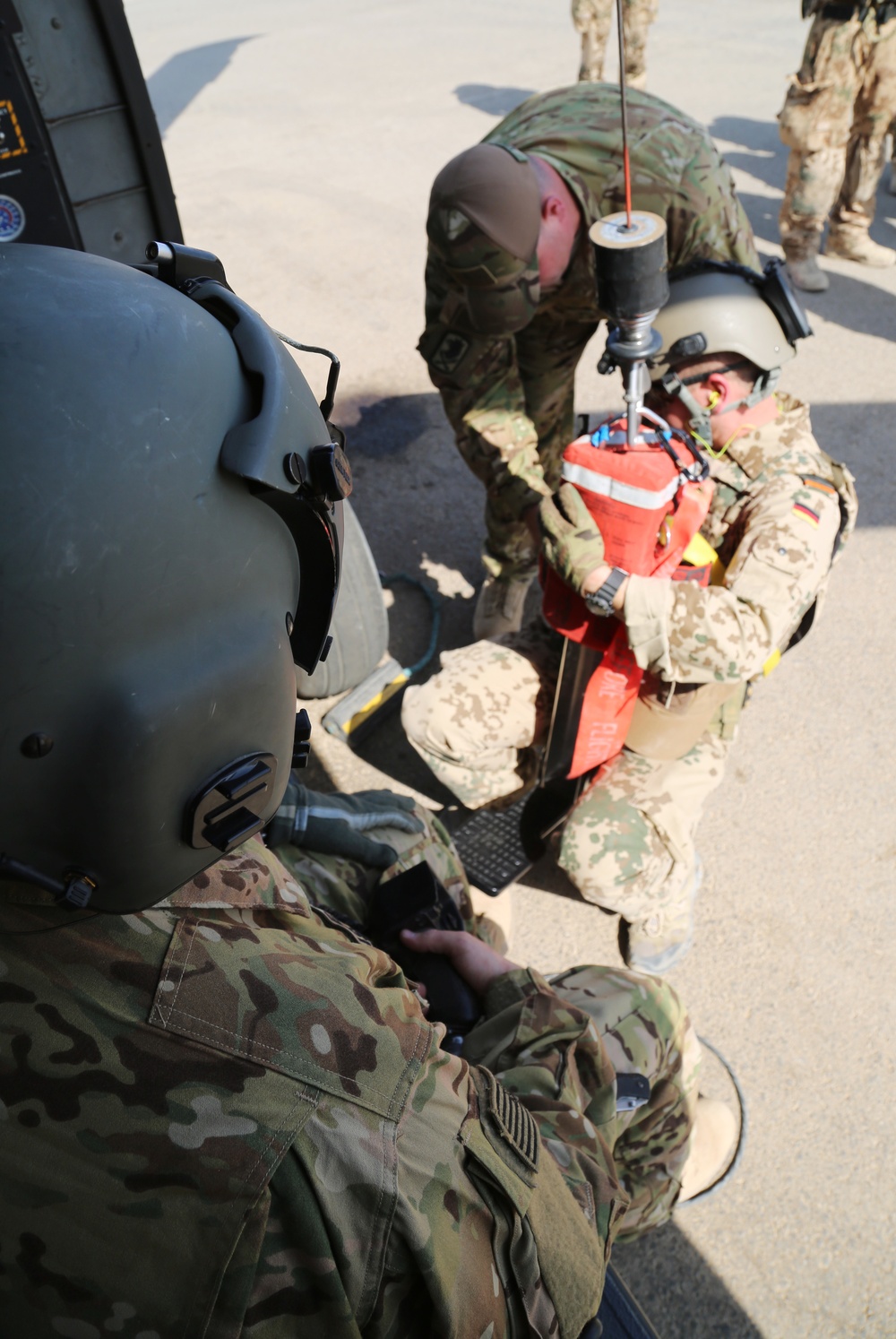 Coalition soldiers conduct medevac training