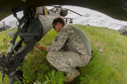 82nd Apache mechanics work at JRTC