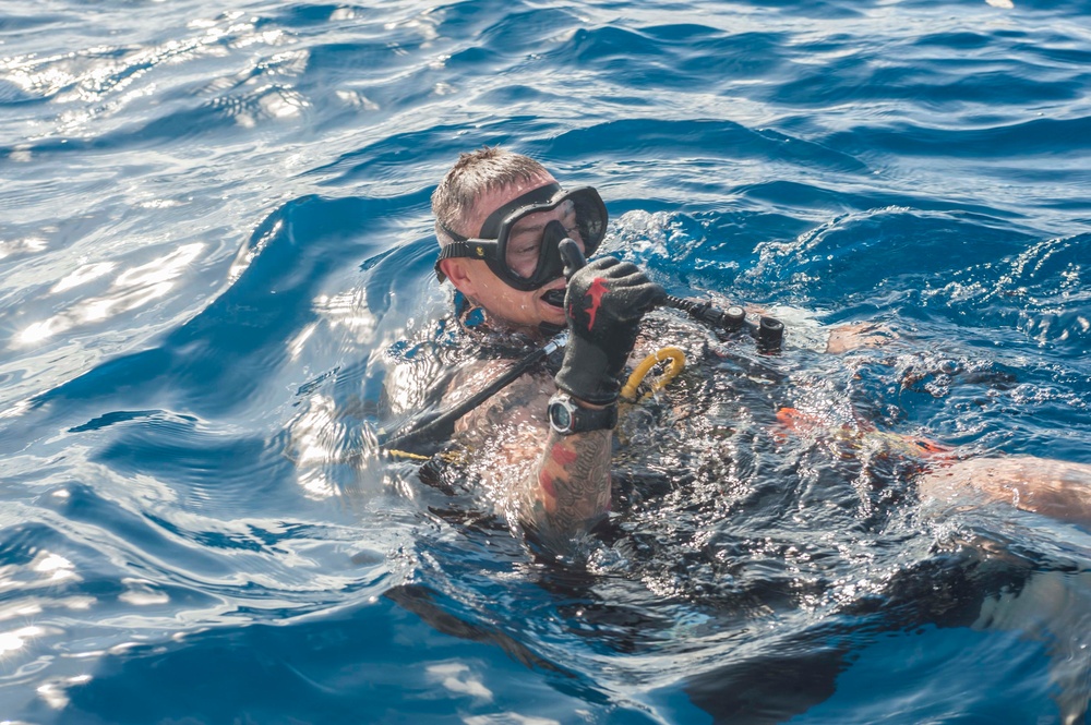 Defense POW/MIA Accounting Agency (DPAA) and 7th Engineer Divers third day of diving in the waters of U.S. Army Garrison Kwajalein Atoll