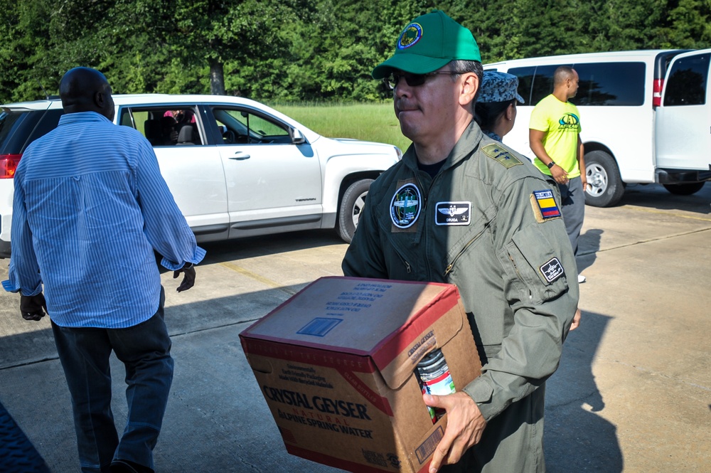 Visiting Colombian Airmen donate supplies for Louisiana flood victims