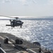 MH-60S Sea Hawk delivers supplies to USS Bonhomme Richard.