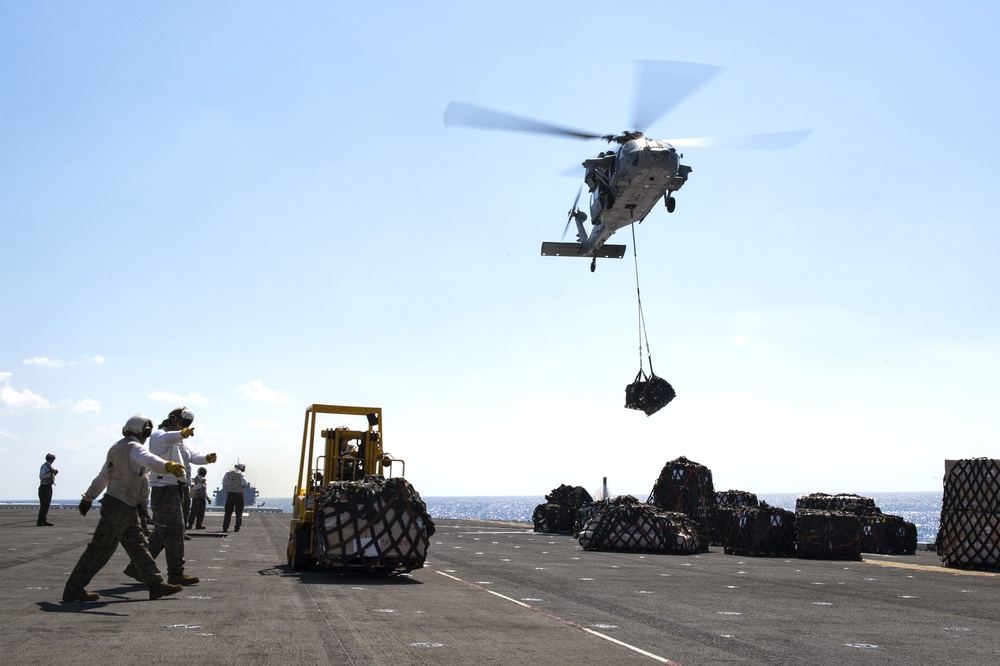 USS Bonhomme Richard (LHD-6) replenishment at sea;