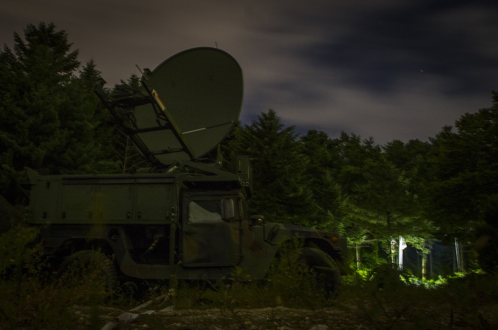 Satellite truck at night
