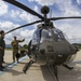South Korean pilots check out a Kiowa Warrior