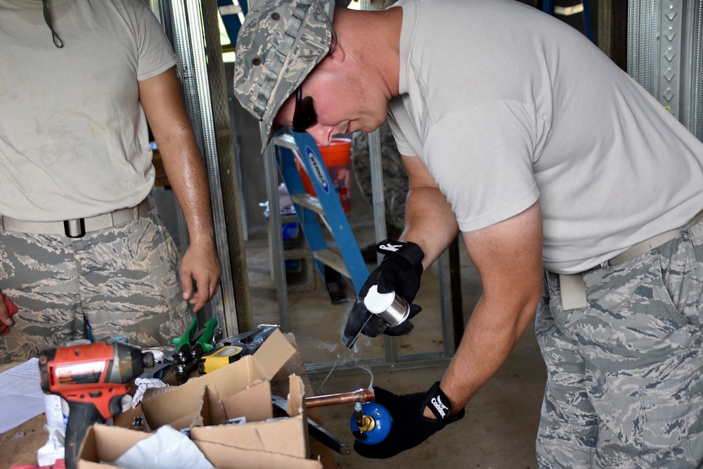 143 CES Provides Assistance Through Innovative Readiness Training