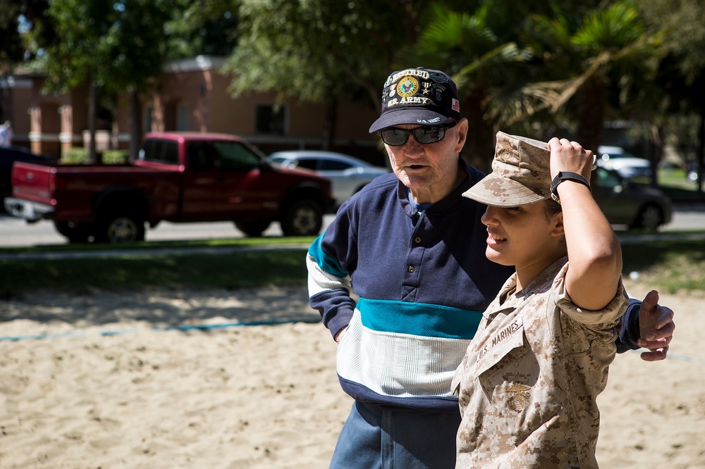 Sea Service Members Roll Up Sleeves to Help Vets