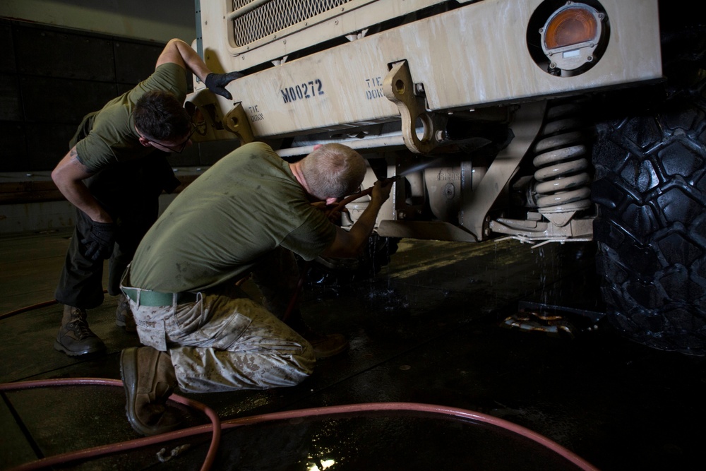 22nd MEU Marines Wash Vehicles Aboard The USS Wasp