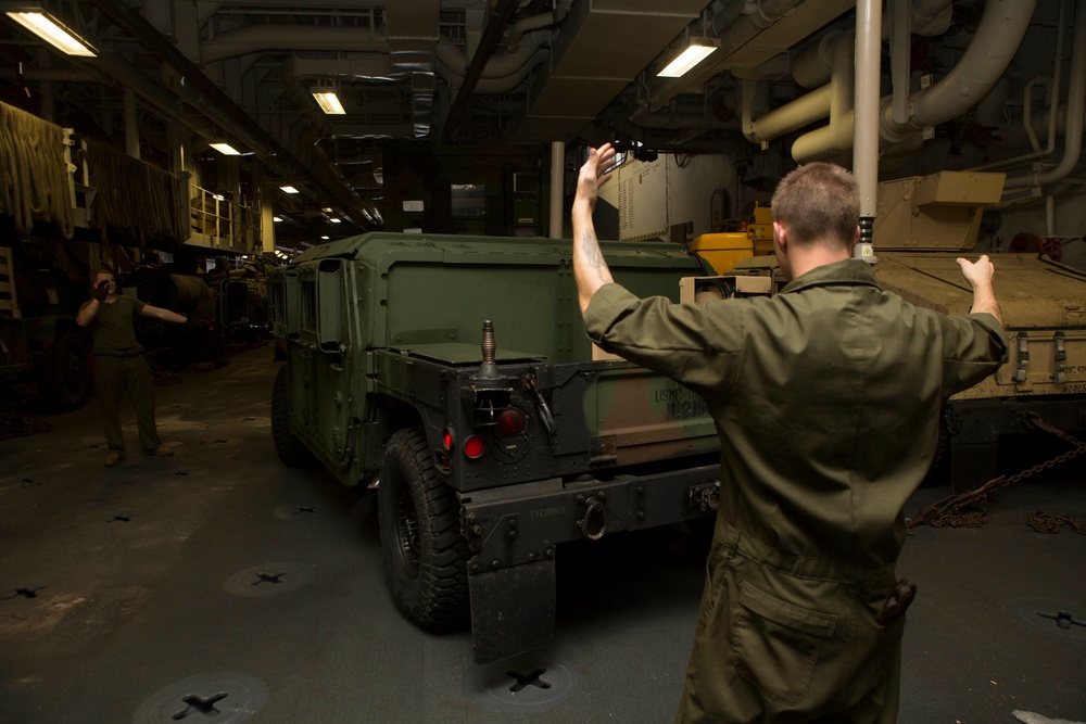 22nd MEU Marines Wash Vehicles Aboard The USS Wasp