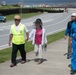 Okinawa residents participate in a tsunami evacuation drill aboard Camp Foster