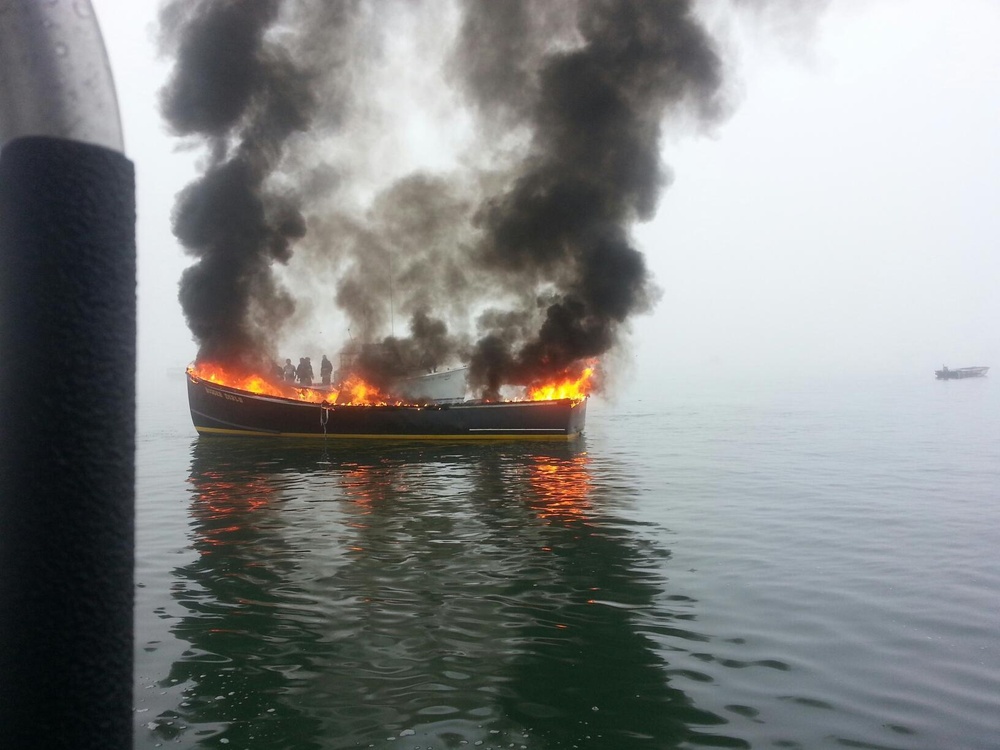 Coast Guard fights boat fire in Jonesport, Maine