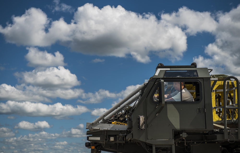 Air Commandos fly low and drop cargo
