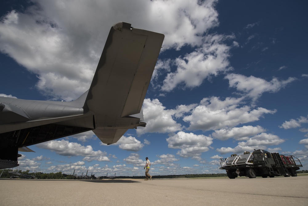 Air Commandos fly low and drop cargo