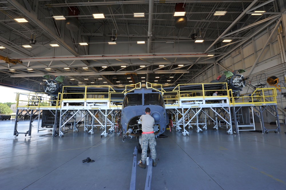801st SOAMXS Airmen perform maintenance on a CV-22 Osprey