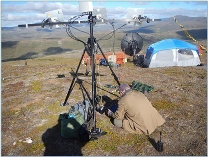 Donald Decker sets up remote communications gear in Nome