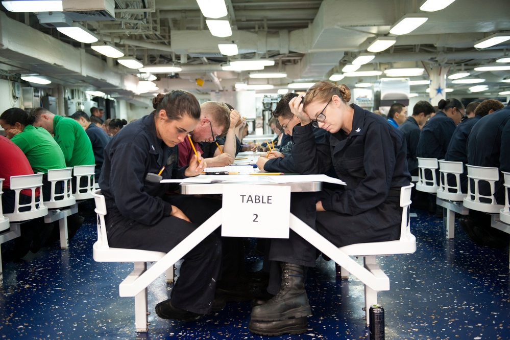 USS America (LHA 6) Sailors take exam