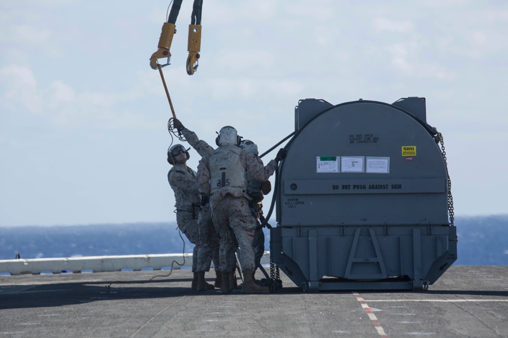 22nd MEU Marines Lift Harrier Engine from Wasp to Big Horn