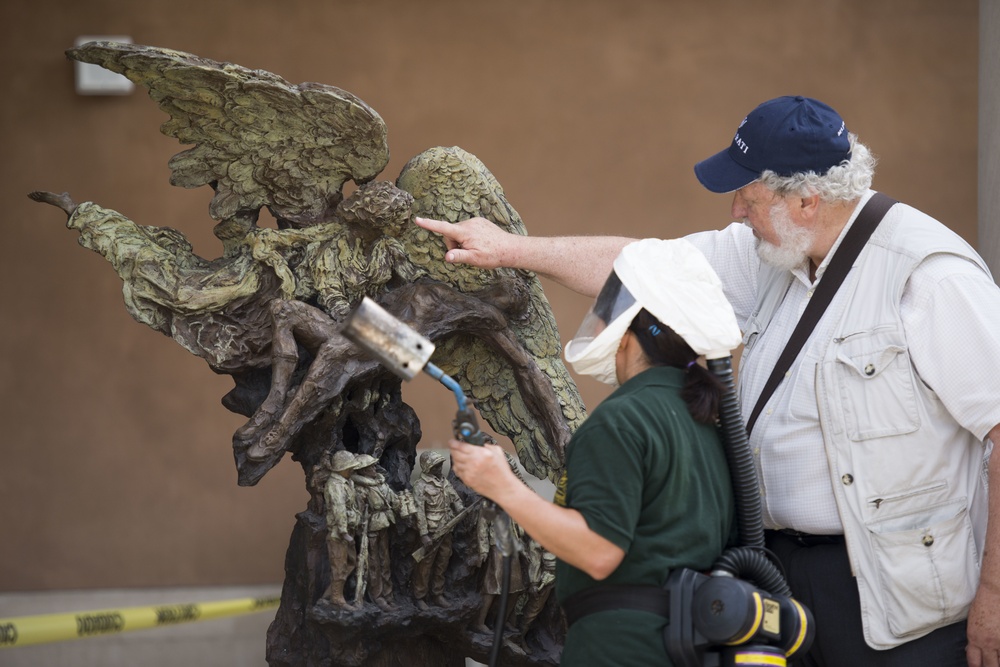 Greg Wyatt’s “Price of Freedom” sculpture undergoes yearly maintenance