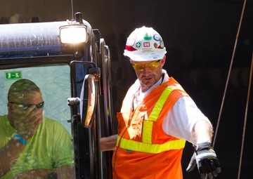 Removal of flood debris restricting drainage in Ellicott City